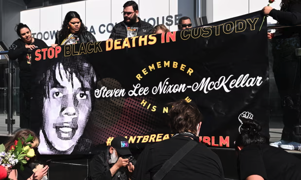 Family and friends of Aboriginal man Steven Lee Nixon-McKellar rally outside the Toowoomba magistrates court ahead of an inquest into his death which was captured on body-worn camera. Photograph: Darren England/AAP