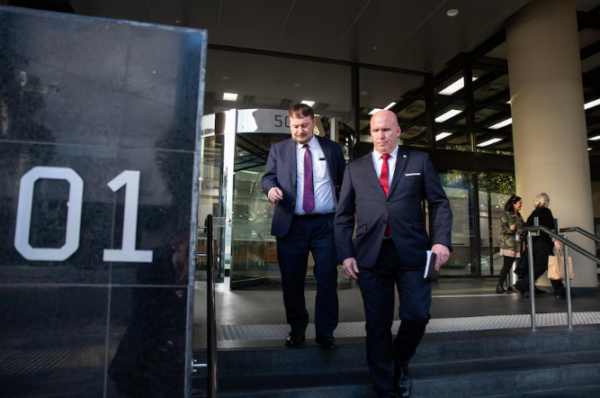 Former Justice Department boss Adam Tomison (left) broke down when testifying at the inquest. (ABC News: Keane Bourke)