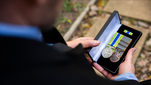 Mr Reynolds was awarded the Australian Corrections Medal. ABC News: Keane Bourke