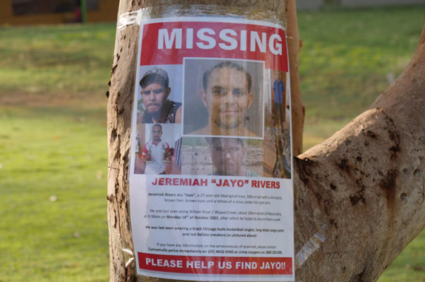 Family members shared missing person posters to raise awareness about Jeremiah Rivers at a gathering marking the anniversary of his disappearance. (ABC Kimberley: Ted O'Connor)